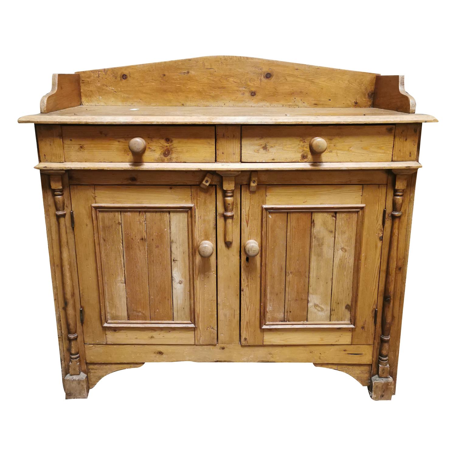 19th C. Irish Pine cabinet.