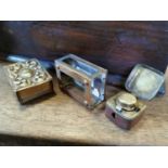 Two 19th. C. match strike boxes and a travel light