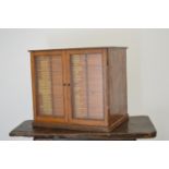 Late 19th. C. oak collector's specimen cabinet