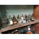 Fifteen 19th. C. glass chemist's bottles