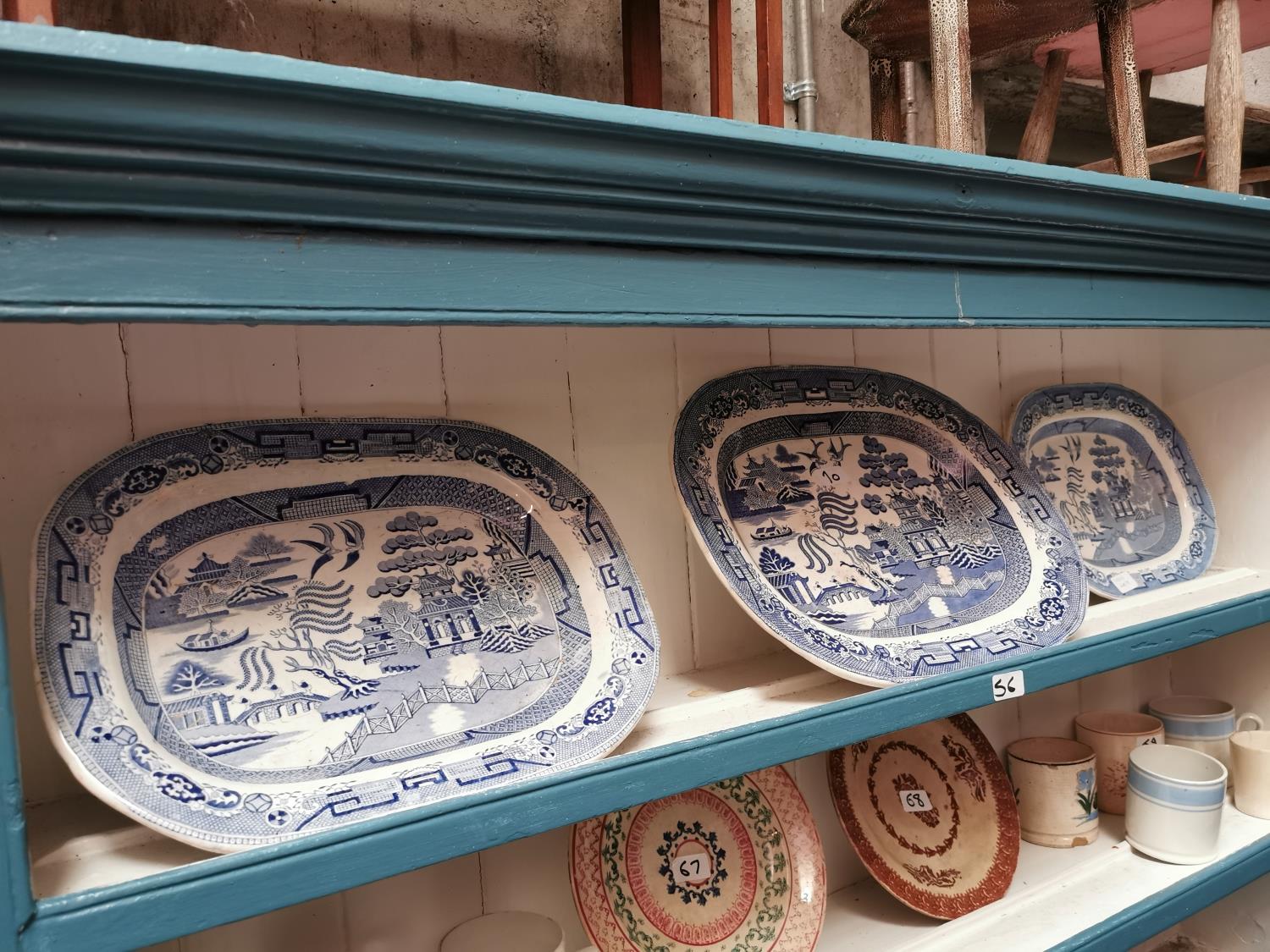 Three blue and white ceramic platters