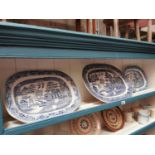 Three blue and white ceramic platters