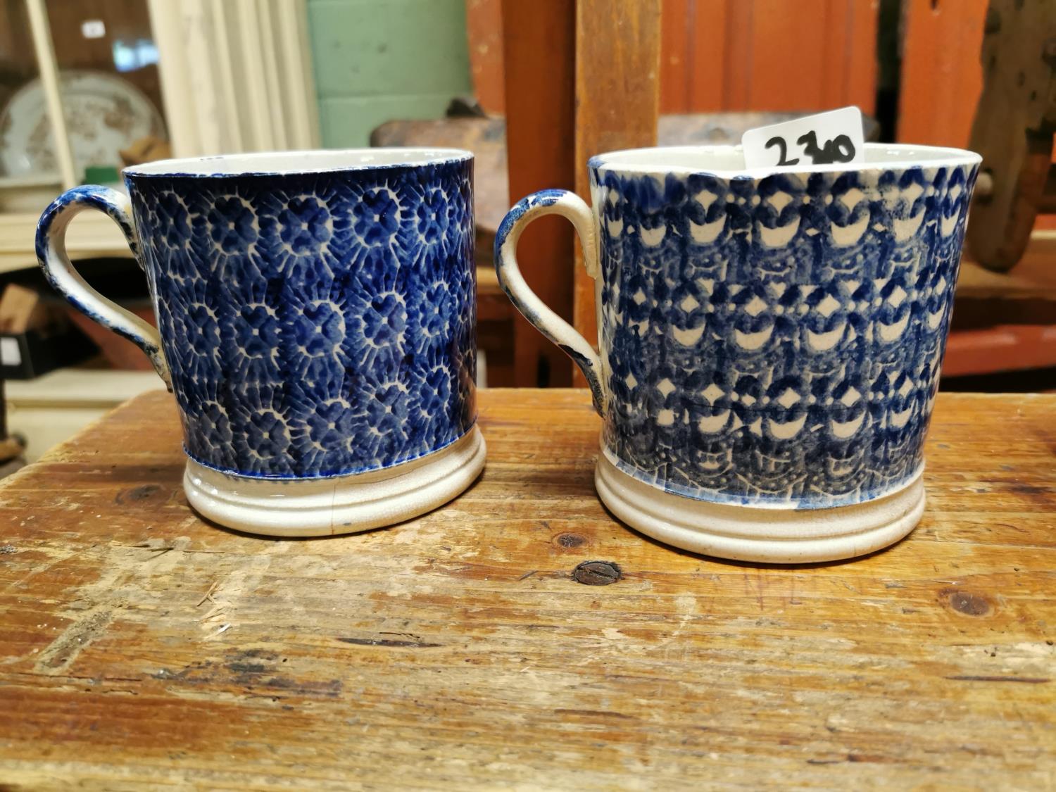 Two 19th C. spongeware mugs.