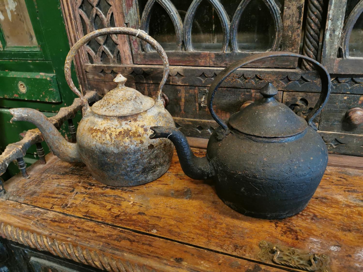 Two early 20th. C. cast iron kettles