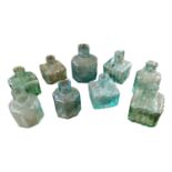 Collection of glass ink bottles.