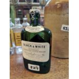 1960's Black and White whiskey bottle
