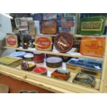 Collection of old advertising tins