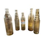 Collection of five glass Oil bottles