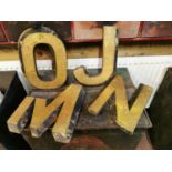 Four hand carved shop letters