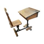 Early 20th. C. oak and cast iron school desk