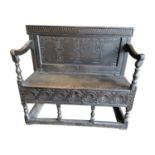 Early 18th C carved oak monk's bench