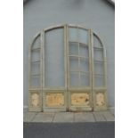 Large pine arched entrance door.