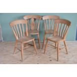 Four pine kitchen dining chairs.