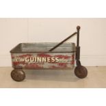 Cool Guinness Time advertising cart.