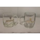 Pair of Guinness advertising tankards.