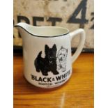 Black and White Scotch Whisky ceramic advertising jug