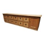 Good quality pine shop counter bank of drawers