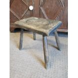 19th C. elm milking stool.