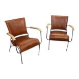 Pair of leather upholstered metal framed easy chairs