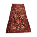 Persian hand knotted wool carpet runner.