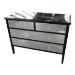 Painted wooden chest of drawers with mirrored insets