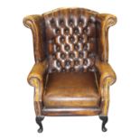 Deep buttoned chesterfield wingback armchair
