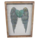 Metal Angel Wings mounted in an oak frame