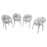 Set of four branch design perspex chairs