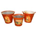 Three metal painted advertising buckets