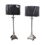 Pair of brushed steel table lamps.