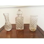 Two Waterford crystal vases and cut glass decanter.
