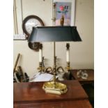 Brass desk lamp with painted metal shade.