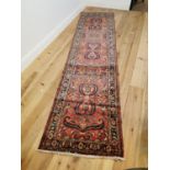 Hand knotted Persian carpet runner.