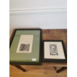 Two black and white wood cut prints