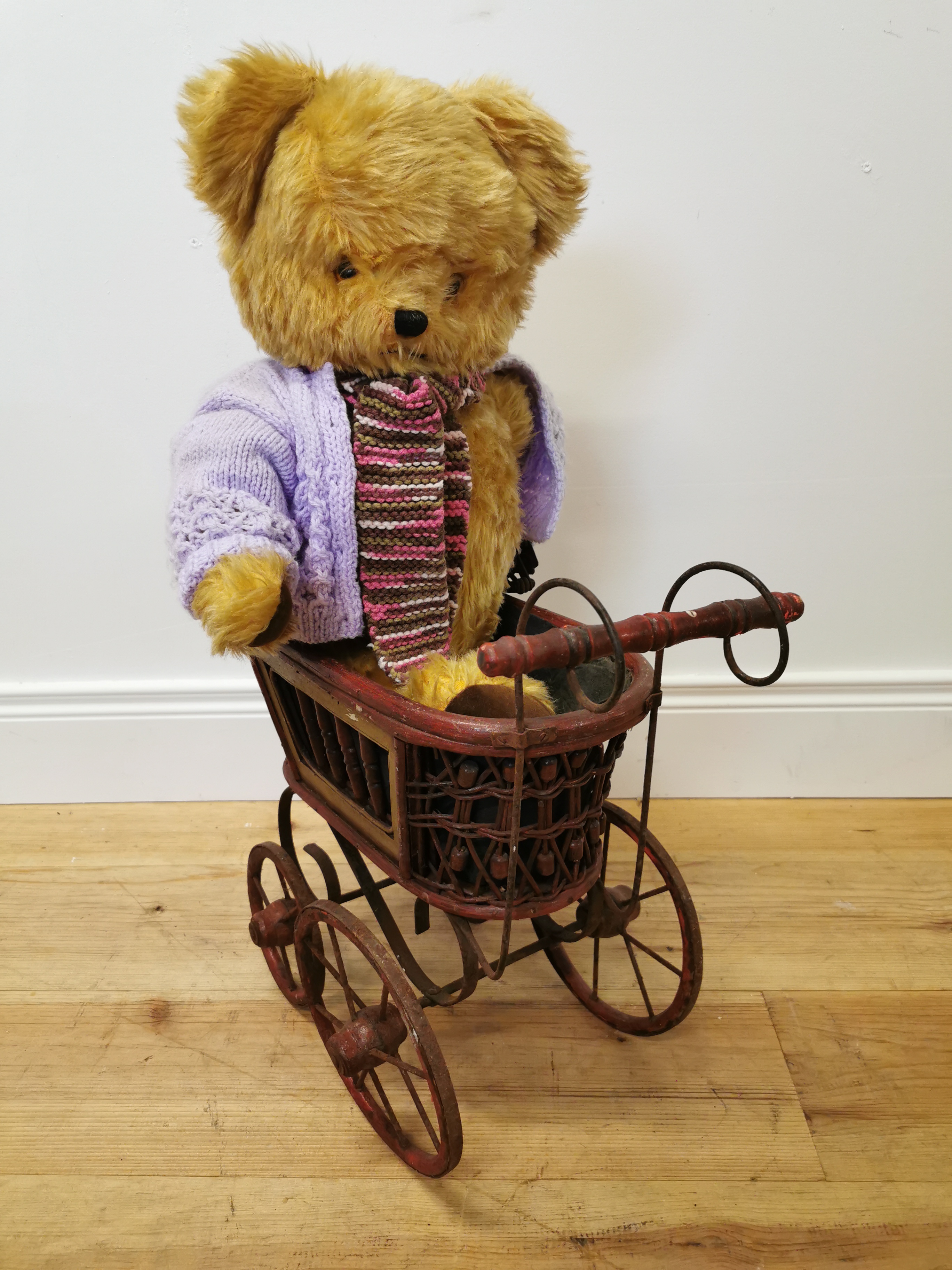 Merrythought teddy and pram