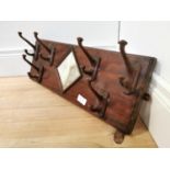 Early 20th. C. mahogany and cast iron coat rack