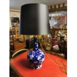 Early 20th C. Oriental blue and white ceramic lamp.