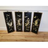 Set of four Japanese ebonised panels