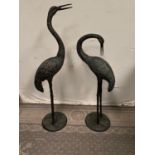 Pair of bronze storks