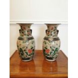 Pair of Oriental ceramic vases.