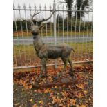 Cast iron model of a stag on plinth.