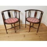 Pair of Edwardian mahogany arm chairs.