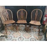 Three early 19th C. ash and elm kitchen chairs .