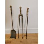 Set of Edwardian brass fire irons.