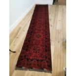 Hand knotted Persian carpet runner.