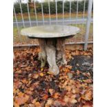 Driftwood garden table with marble top.