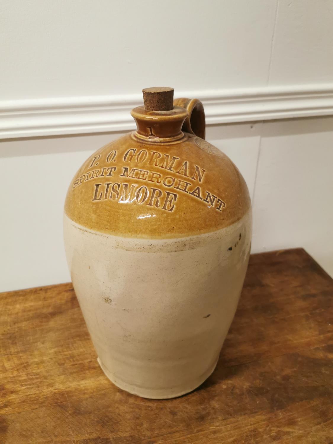 Early 20th C. Gorman Spirit Merchants Lismore stoneware advertising flagon.