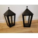Pair of cast iron candle holders