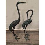 Pair of bronze storks