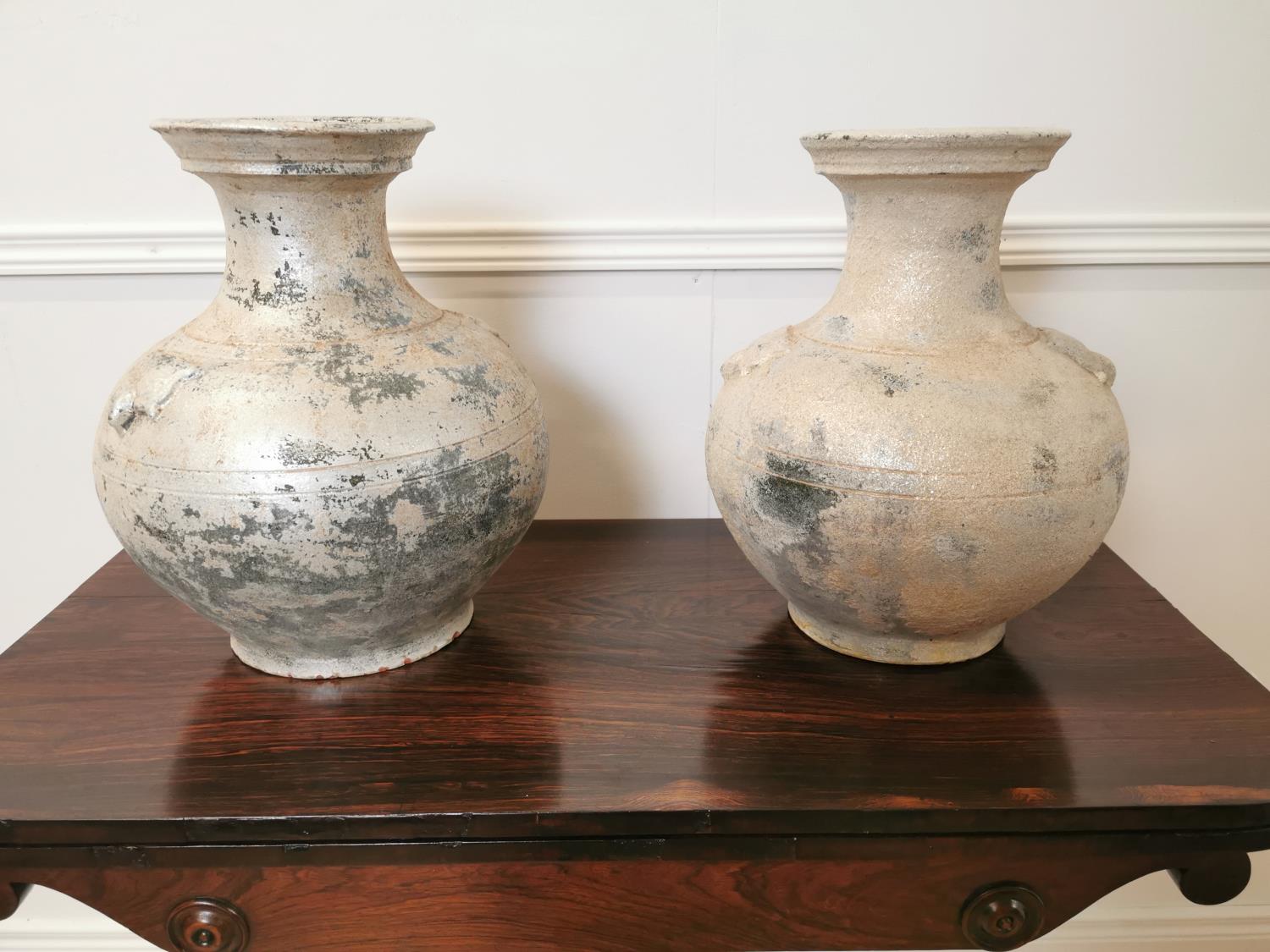 Pair of Oriental style glazed terracotta vases.